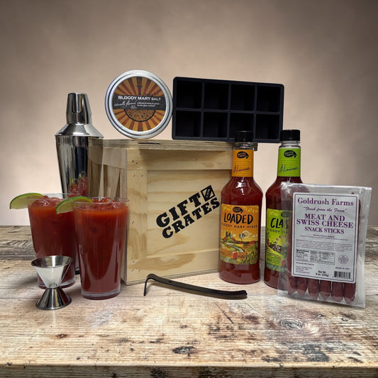 Bloody Mary Gift Crate includes, bloody mary mix, cocktail shaker, meat sticks, large ice cube tray, salt, jigger, and crowbar.