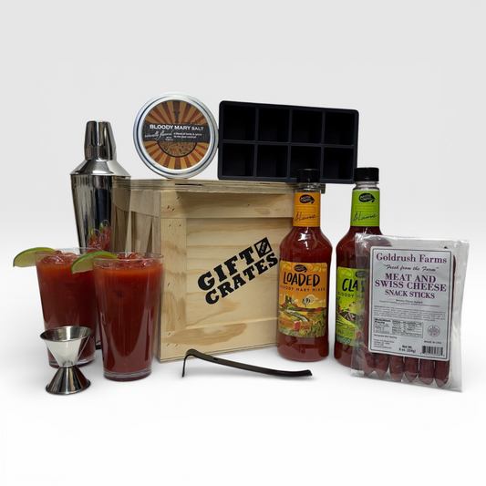 Bloody Mary Gift Crate includes, bloody mary mix, cocktail shaker, meat sticks, large ice cube tray, salt, jigger, and crowbar.